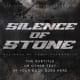 Premade book cover featuring cracked concrete and shattered glass with bold, distressed text reading “Silence of Stone.”